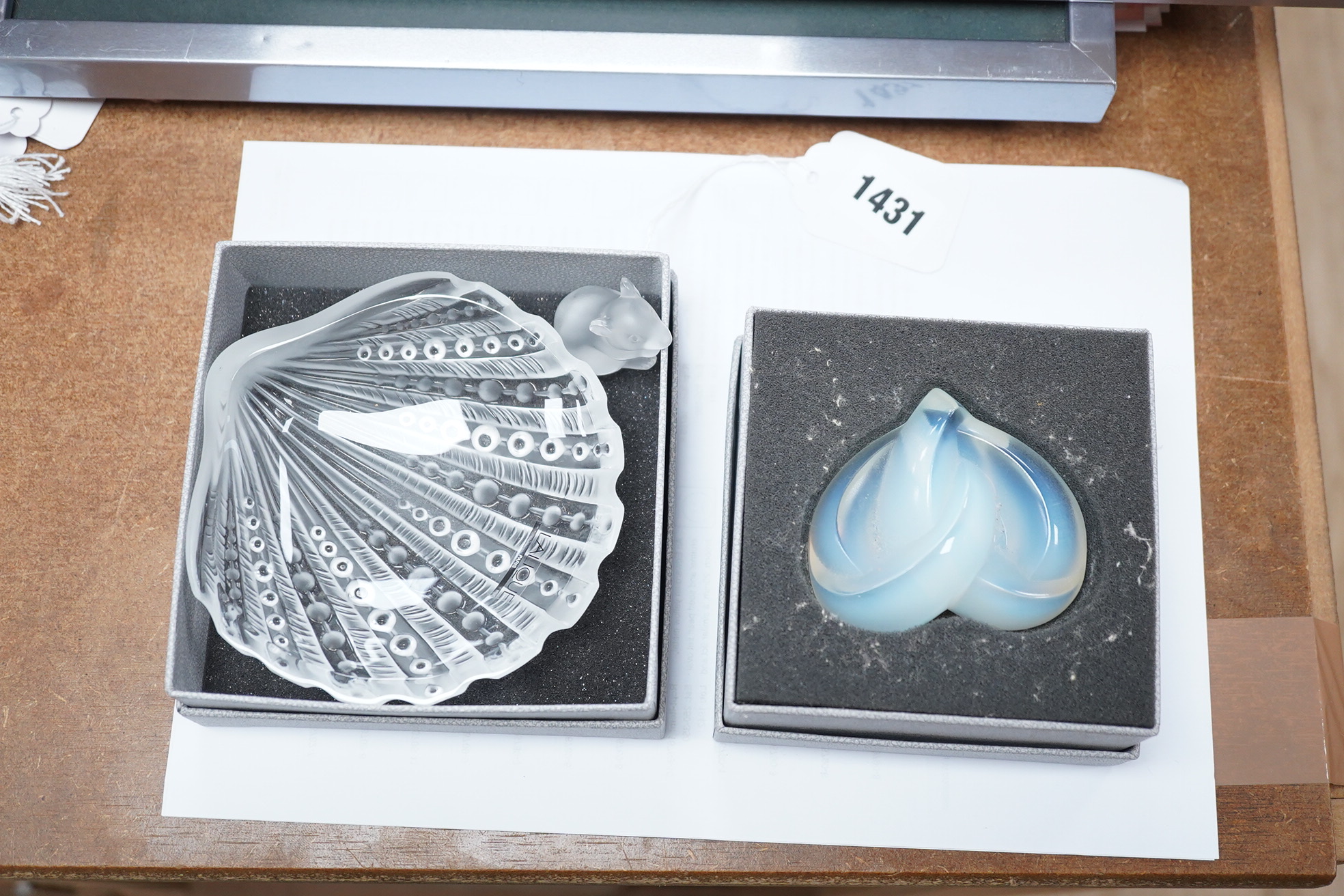 Three items of modern Lalique glass comprising paperweight in the form of a heart, shell dish and mouse, two boxed, largest 12.5cm. Condition - good